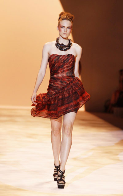 Models present creations from the Christian Siriano Spring 2011 collection during New York Fashion Week
