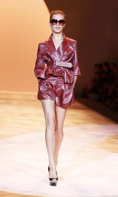 Models present creations from the Christian Siriano Spring 2011 collection during New York Fashion Week