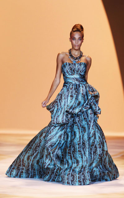 Models present creations from the Christian Siriano Spring 2011 collection during New York Fashion Week