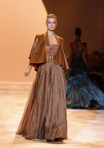 Models present creations from the Christian Siriano Spring 2011 collection during New York Fashion Week