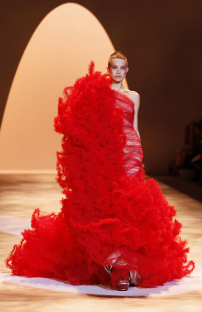 Models present creations from the Christian Siriano Spring 2011 collection during New York Fashion Week