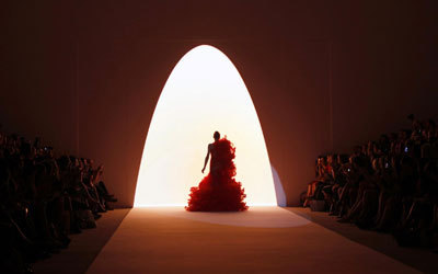 Models present creations from the Christian Siriano Spring 2011 collection during New York Fashion Week