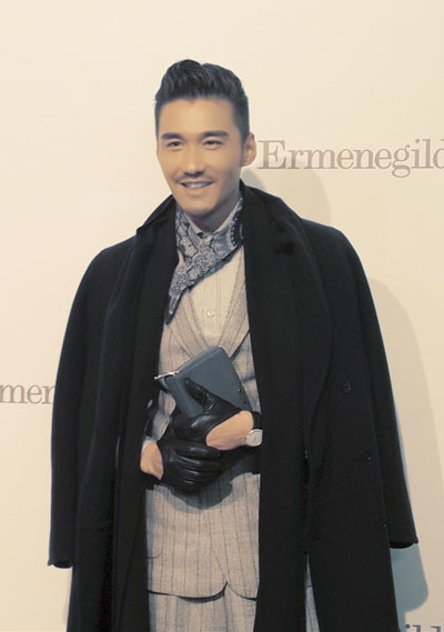 Actor Hu Bing poses at Milan Fashion Week
