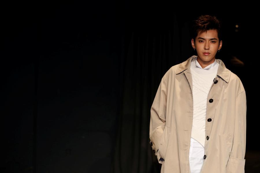 Kris Wu wearing Burberry February collection in Basel, 23 March