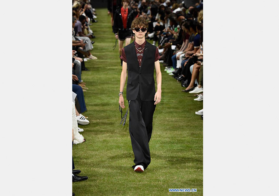 Models present creations of Dior Homme