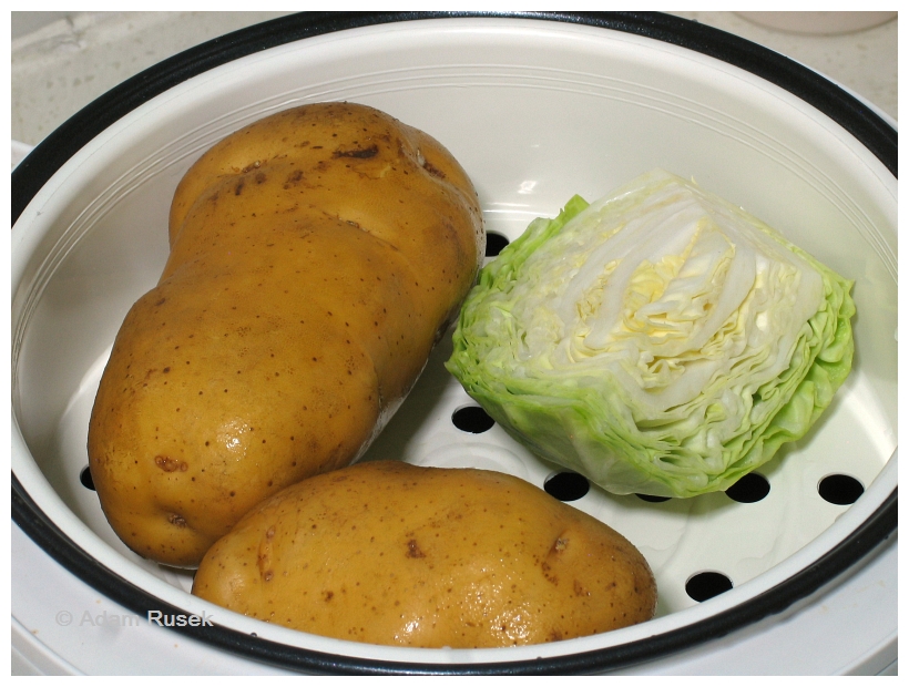 Fried Polish sausage with steamed potatoes and cabbage