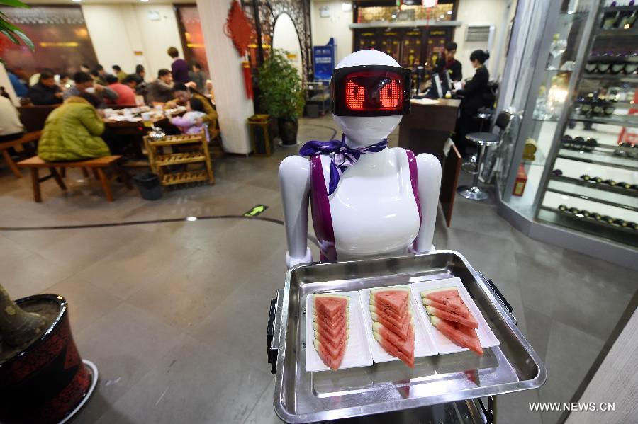 Robot waiter serves customers in Xuchang