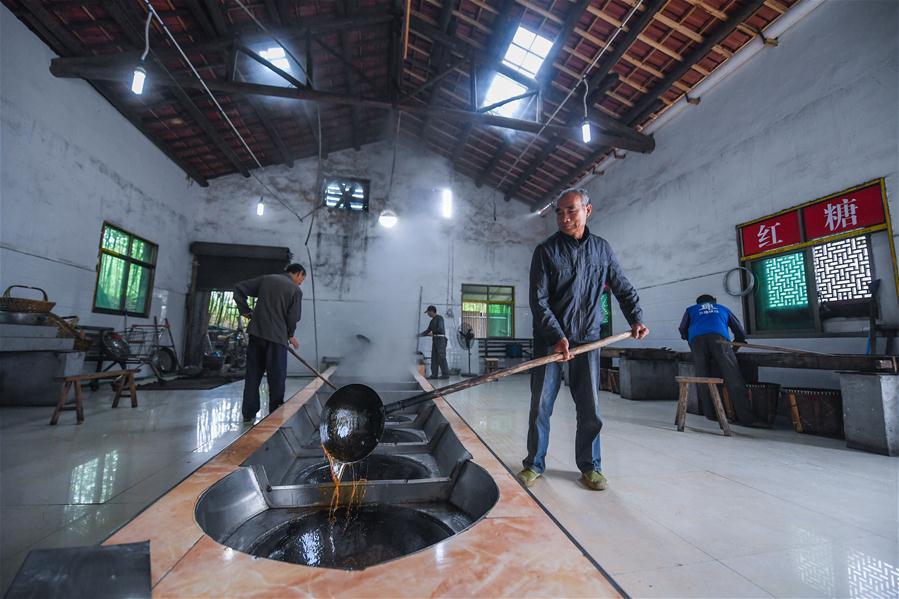 Traditional brown sugar productions in E China village