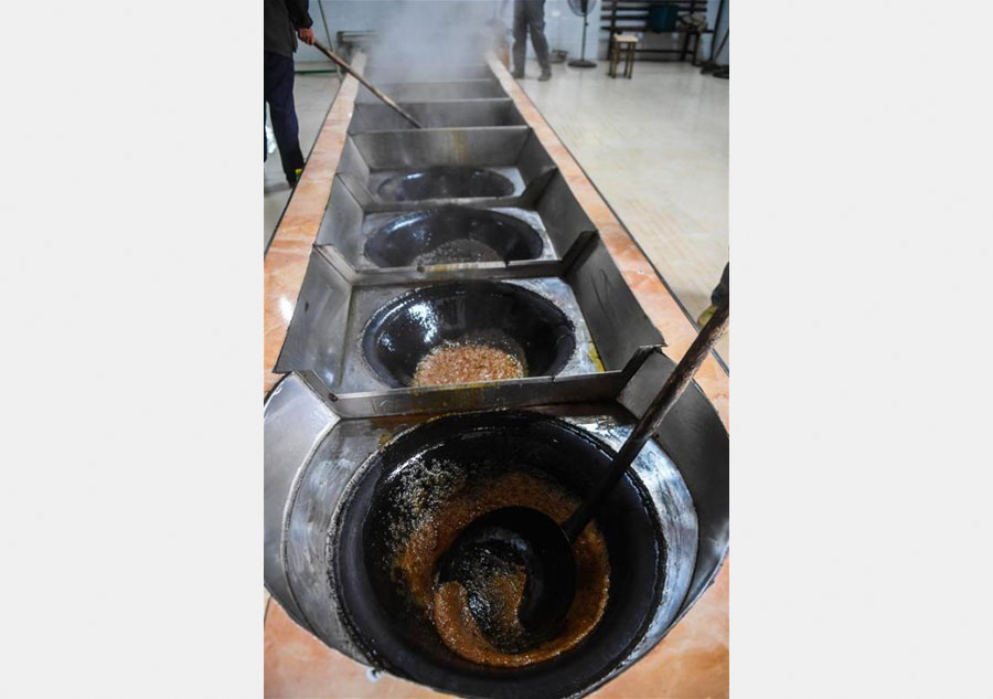 Traditional brown sugar productions in E China village
