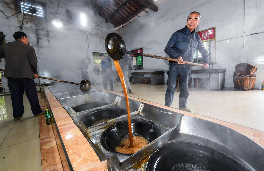 Traditional brown sugar productions in E China village