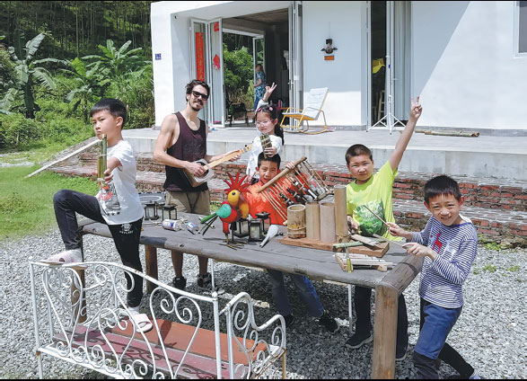 Child band hits high notes with instruments made from garbage