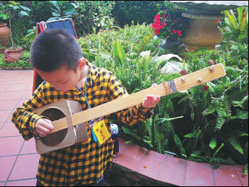 Child band hits high notes with instruments made from garbage