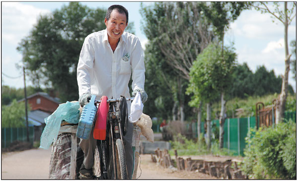 Farmer cleans villages by picking white trash