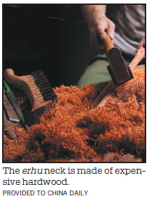 Meicun still sings as erhu production hub