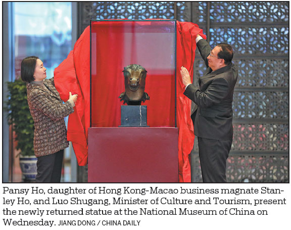 Chinese zodiac statue heads home
