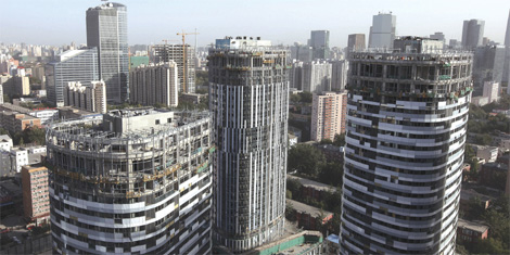 Mainland property to ride urbanization wave