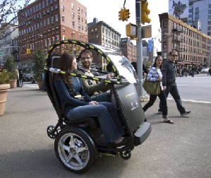 识行人 缓拥堵 通用将推出环保双轮双座电动车