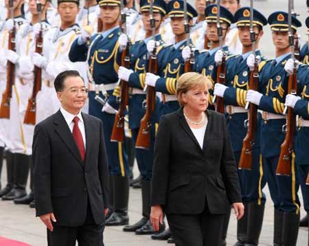 默克尔访华冲破黑客门