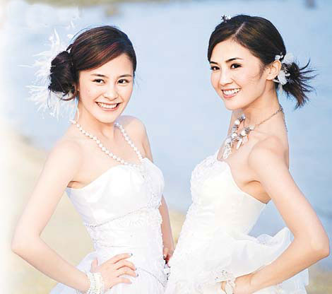 Twins接拍首个婚纱广告 上山下海齐中暑
