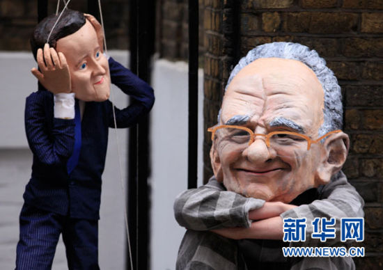 卡梅伦因窃听门事件受质疑可能影响英国政局