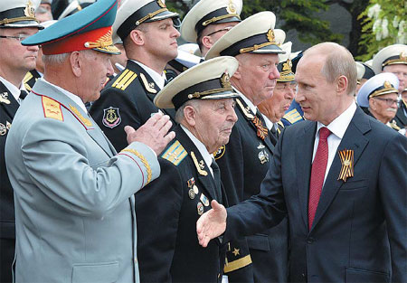 Putin makes triumphal visit to Crimea