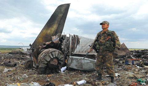 Kiev hits back after plane crash