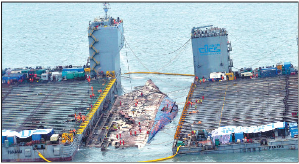 Sunken ferry raised to surface after 3 years