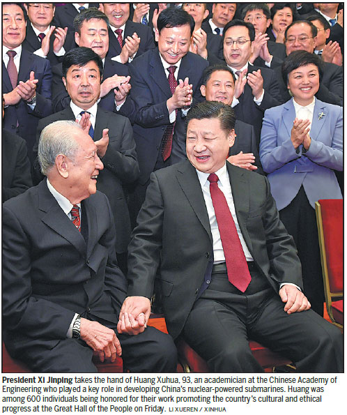 Xi shows great respect for two aged honorees