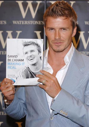 David Beckham signs copies of his new autobiography 'making it real'