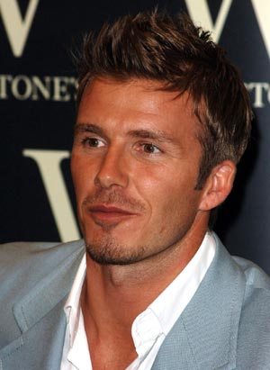 David Beckham signs copies of his new autobiography 'making it real'