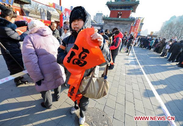 Chinese mark Xiaonian Festival, commemorating 'Kitchen God'