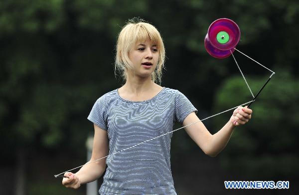 Ukrainian girl shows skills on Chinese diabolo