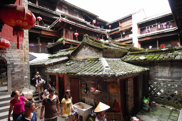 Tourists visit Tulous in Yongding, China's Fujian