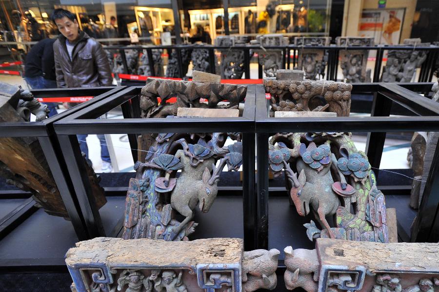 Exhibition of ancient Chinese architectural woodcarving components kicks off in Jinan
