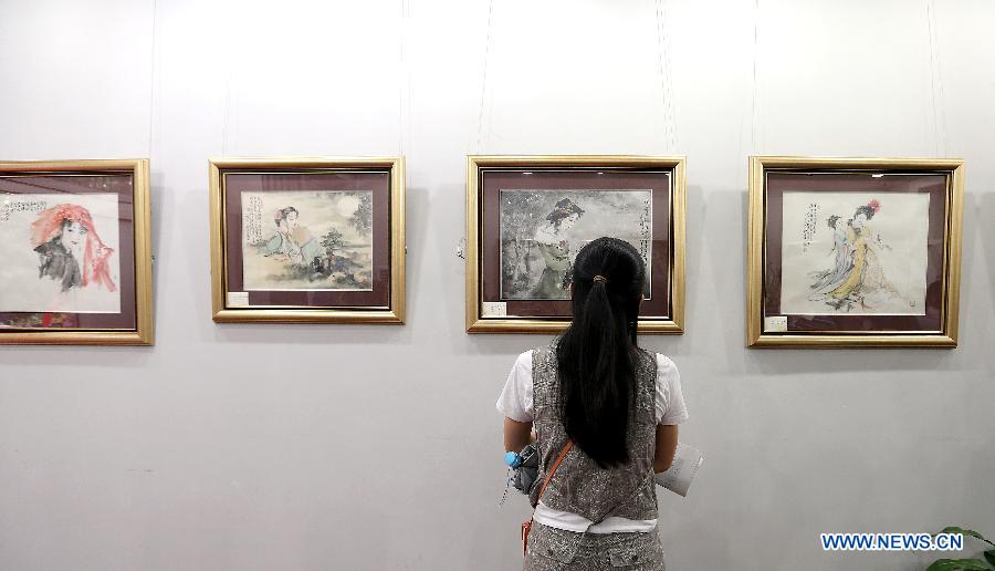 Famed artist's paintings exhibited in Beijing