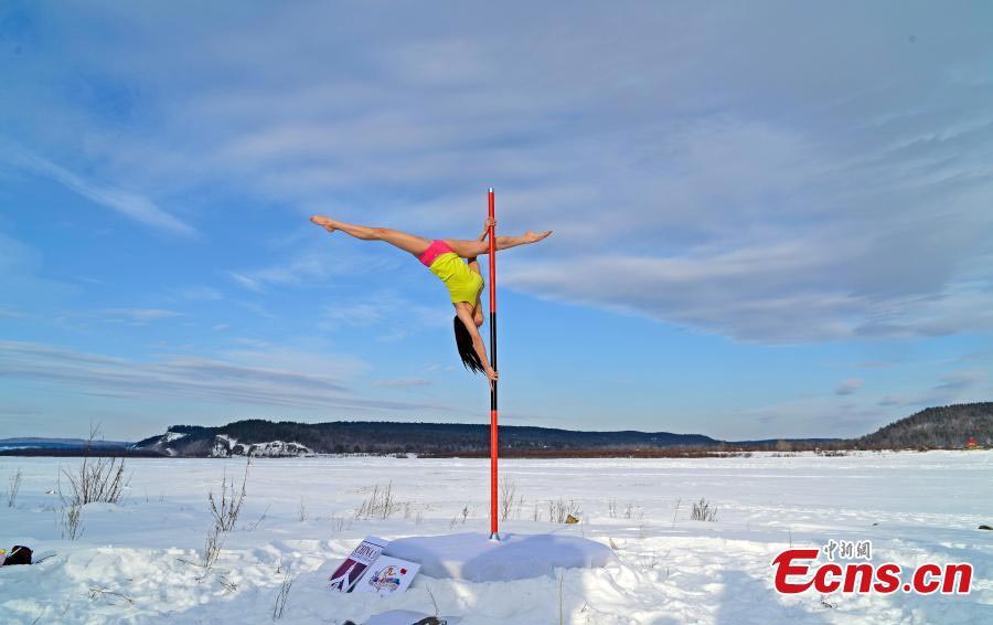 Pole dancers perform in China's North Pole