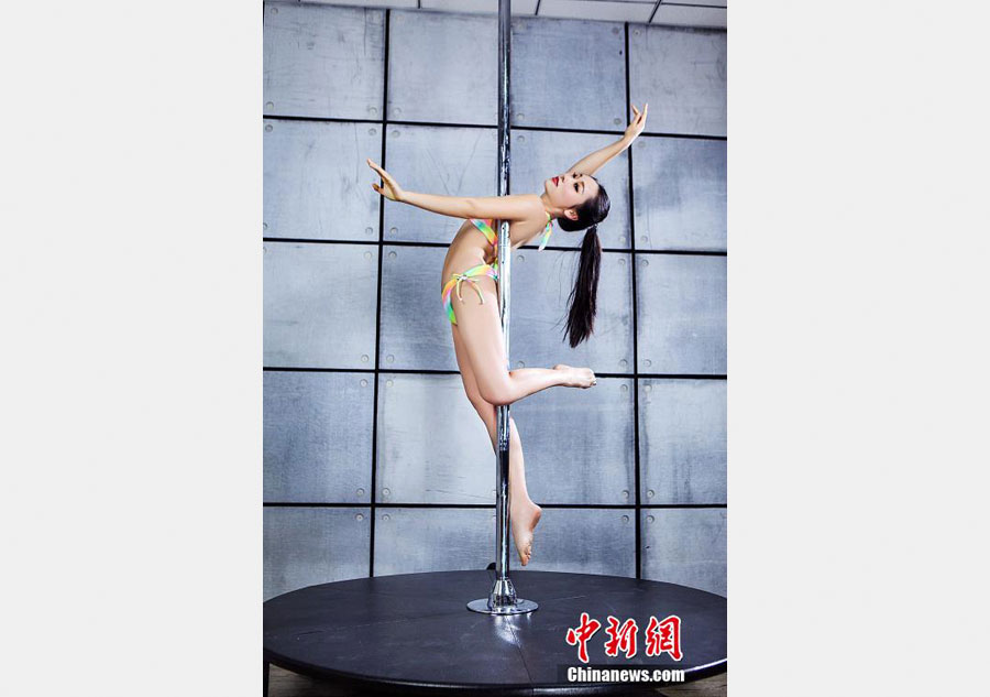 Contestants perform at China pole dance contest