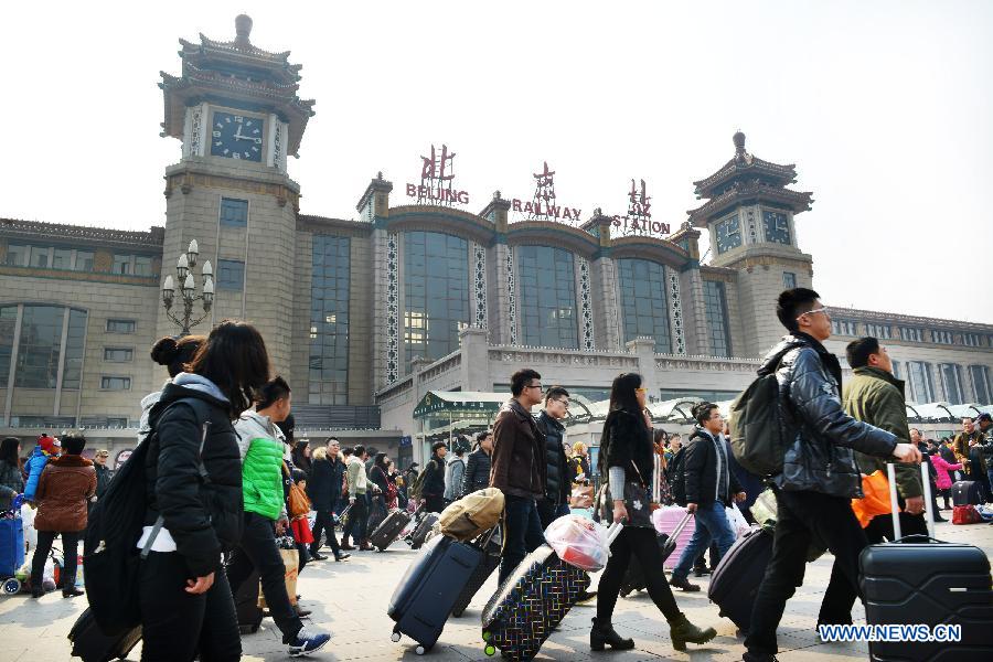 Railway stations witness return peak across China