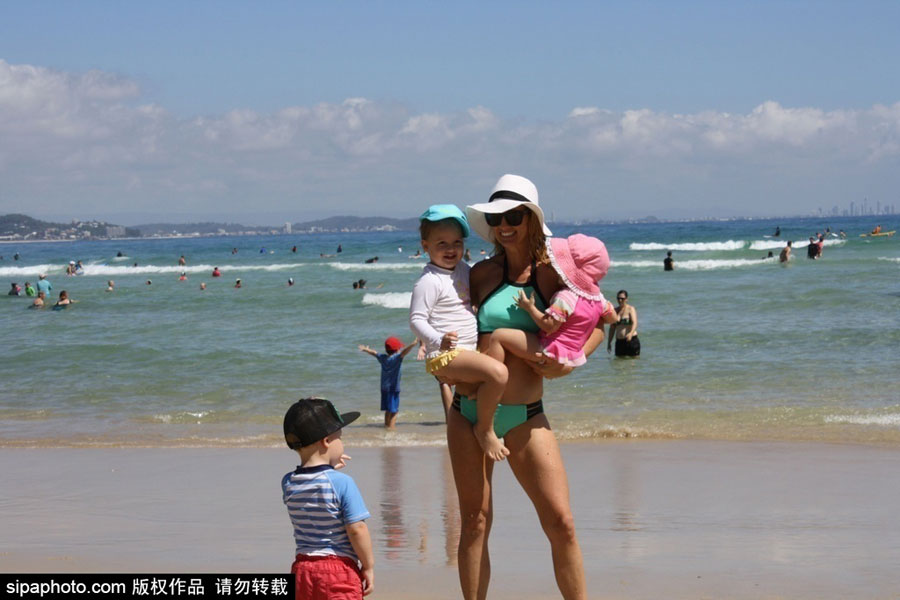 Super fit mother works out with her three children