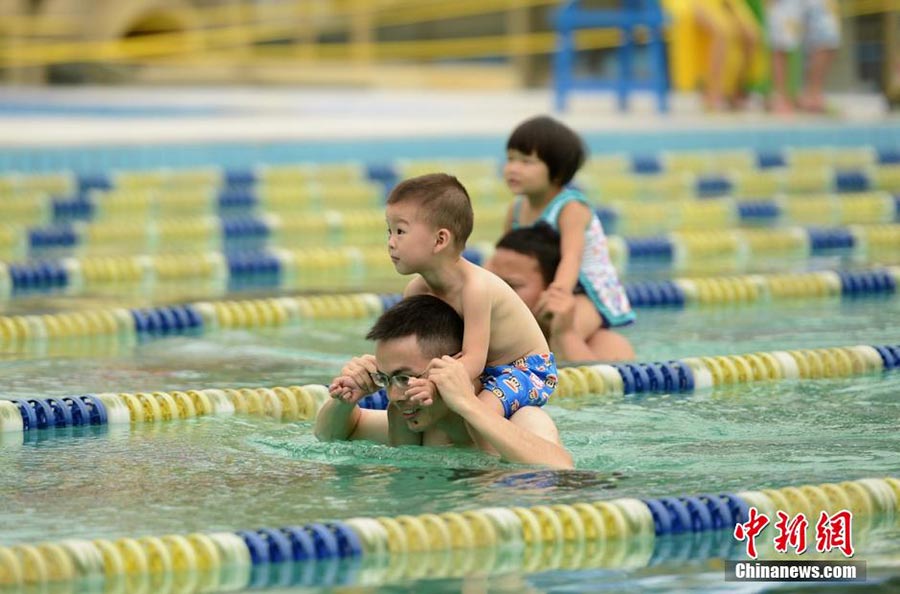 Babies in swimming contest