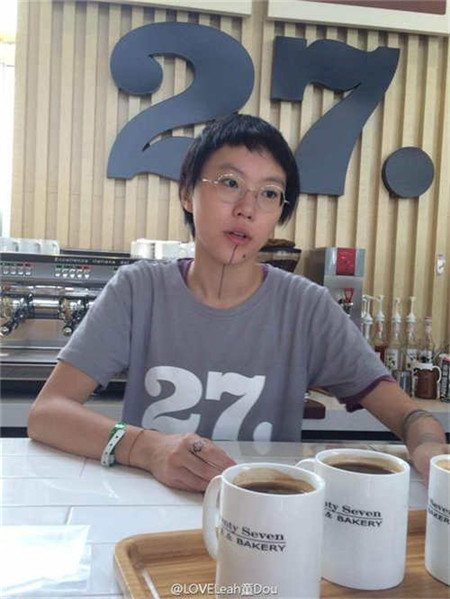 Leah Dou serves coffee in Beijing