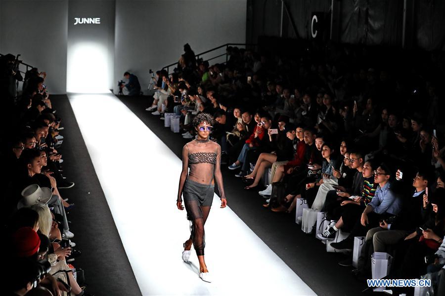 Models present creations during Shanghai Fashion Week