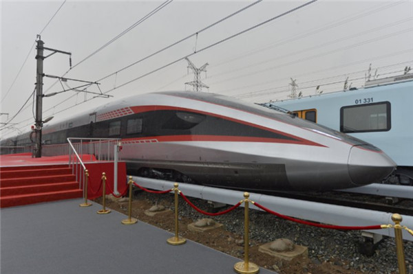 China develops high-speed train to run on different rail systems