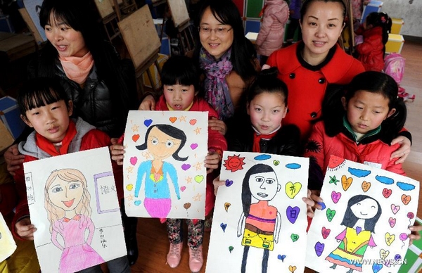 Stay-at-home kids paint portraits for teachers