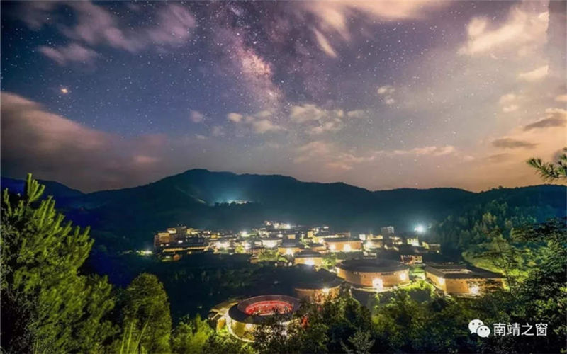 Beautiful starry skies above earthen buildings