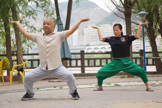 Cave paintings inspire kung fu in NW China