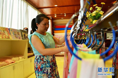 Yizhou's silk industry grows in leaps and bounds