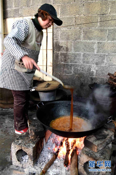Swelled sugar rice sweetens the Spring Festival in Du'an