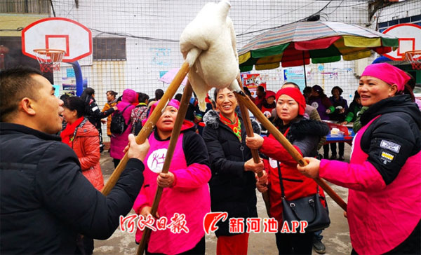 Kitchen God-themed festival kicks off in Jinchengjiang