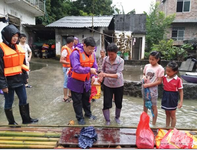 1.6m yuan relief sent to flood-damaged Hechi